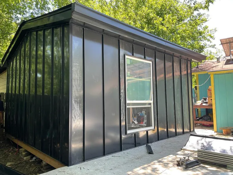 Black standing seam metal wall panels for Roof Inspection in Ringwood