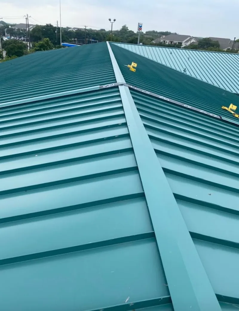 Green commercial metal roof ridge and valley for Metal Roof Repair in Ringwood